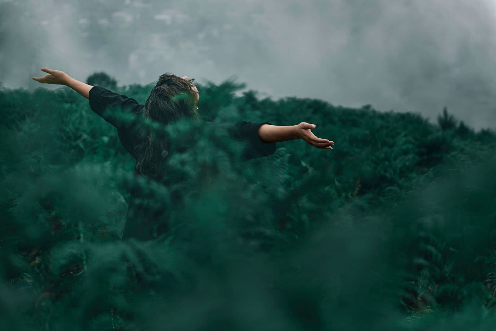 A person breathing fresh air in nature